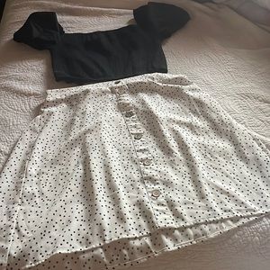 Black off the shoulder crop top with high waisted skirt
